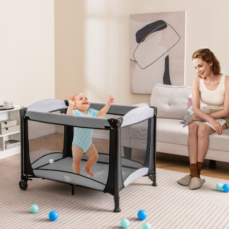 5-in-1 Portable Baby Playard with Changing Table and Storage Basket